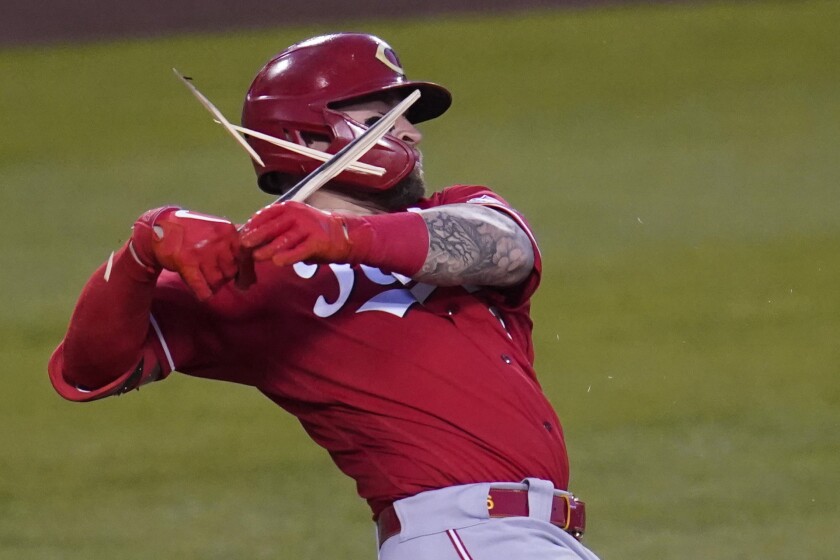 Tucker Barnhart breaks a bat during the second inning.