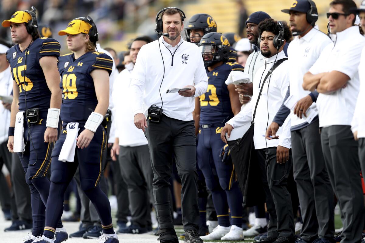 California head coach Justin Wilcox, center, stands on the sideline during the first half of an NCAA college football game against Oregon State in Berkeley, Calif., Saturday, Oct. 30, 2021. (AP Photo/Jed Jacobsohn)