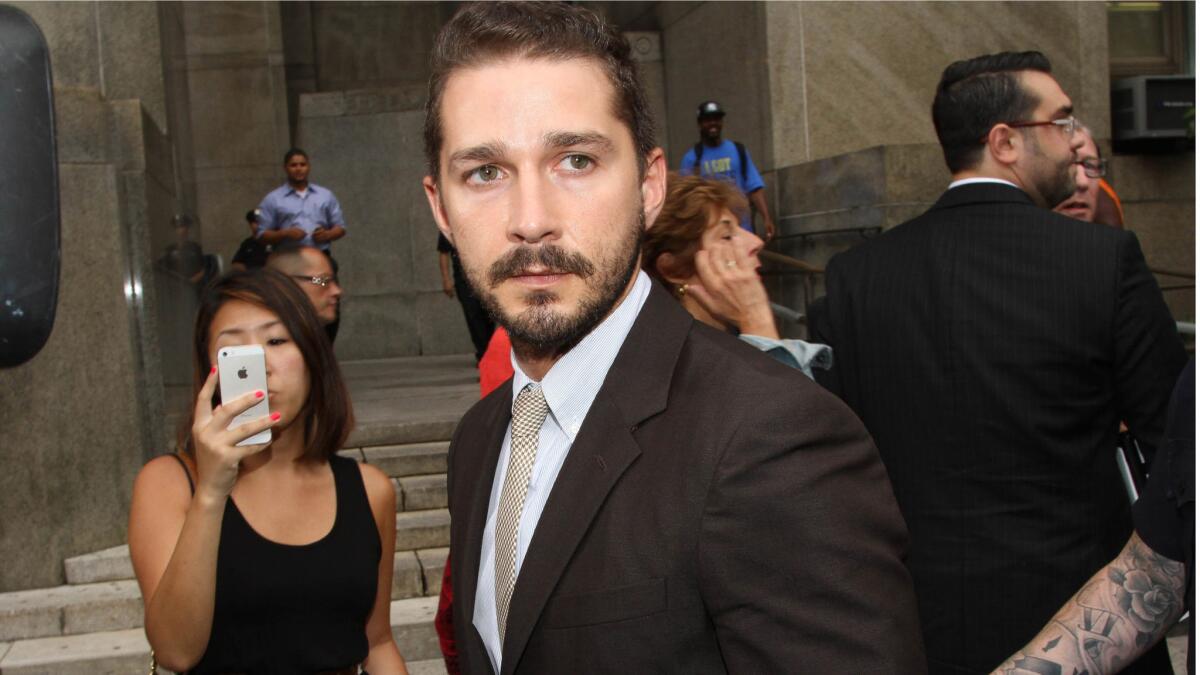 Shia LaBeouf leaves criminal court in New York City on Thursday.
