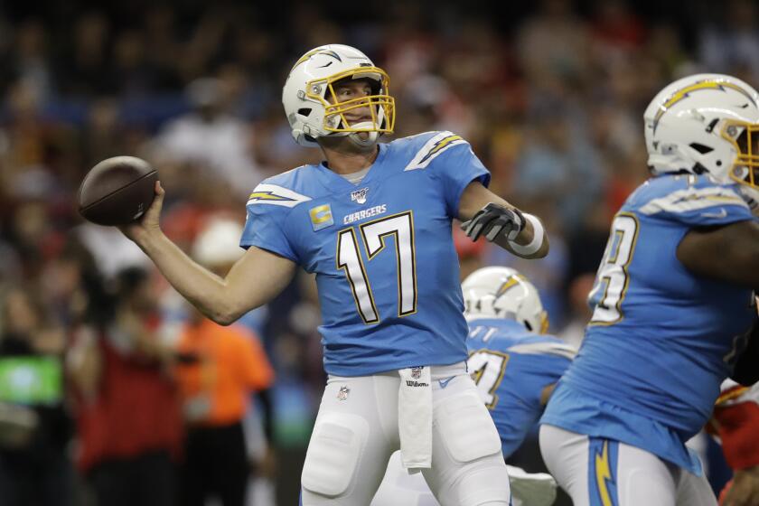 Los Angeles Chargers quarterback Philip Rivers throws a pass during the first half of an NFL football game against the Kansas City Chiefs Monday, Nov. 18, 2019, in Mexico City. (AP Photo/Marcio Jose Sanchez)