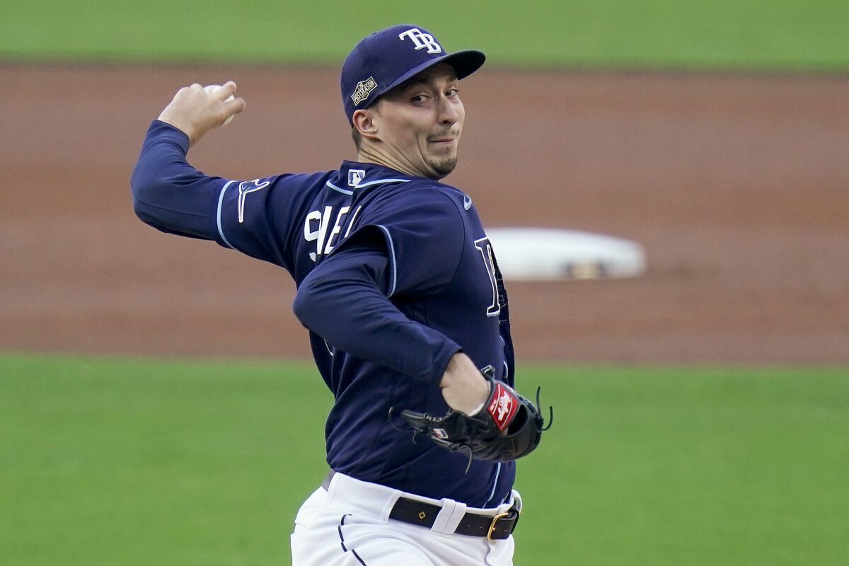 Tampa Bay Rays pitcher Blake Snell delivers against the New York Yankees during the first inning in Game one of a baseball American League Division Series, Monday, Oct. 5, 2020, in San Diego. (AP Photo/Jae C. Hong)