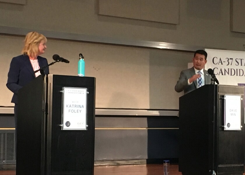 Costa Mesa Mayor Katrina Foley and UC Irvine law professor Dave Min, who are vying for the state Senate seat in District 37, speak at a debate Monday night at UCI.