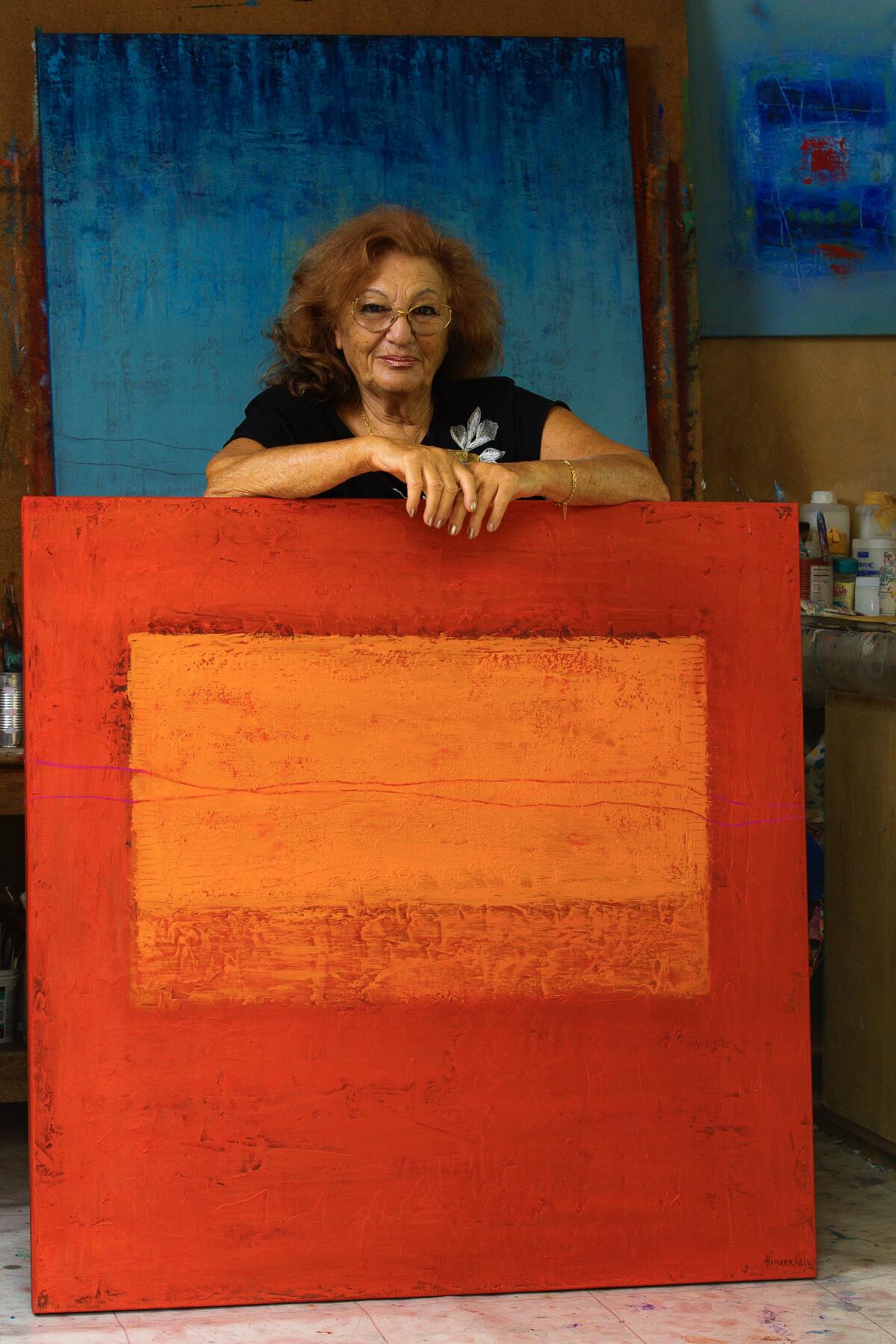 Author Peggy Hinaekian also is a painter of abstract contemporary pieces.