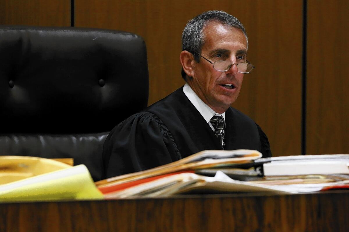 Los Angeles County Superior Court Judge Craig Richman is accused of pushing a woman from behind and knocking her to the ground during an argument.