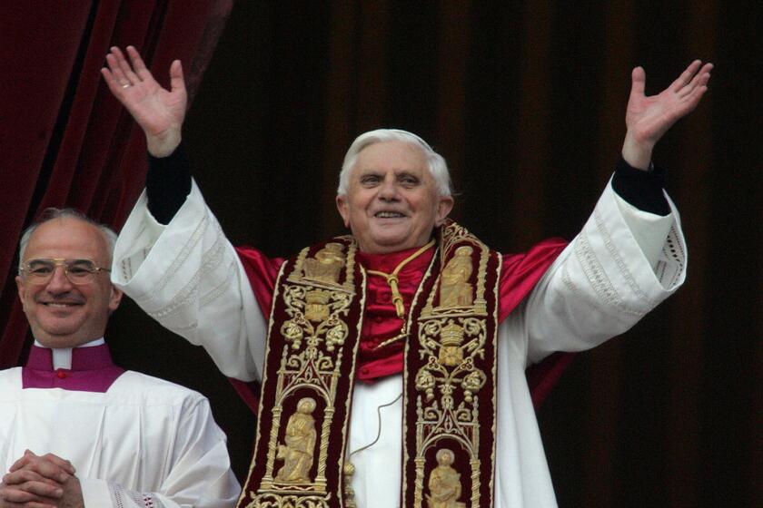 The former Cardinal Joseph Ratzinger is presented to the masses as Pope Benedict XVI -