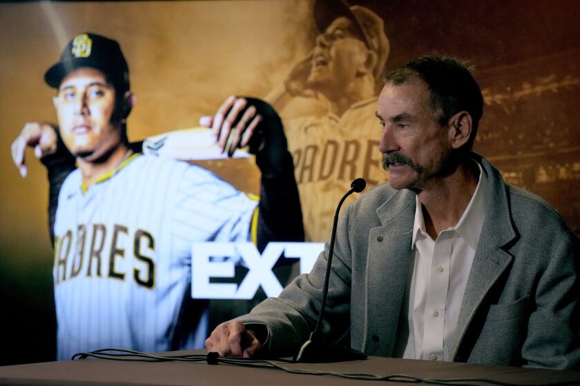 San Diego Padres owner Peter Seidler talks about the 11-year contract extension for third baseman Manny Machado during a news conference Tuesday, Feb. 28, 2023, at the team's spring training baseball facility in Peoria, Ariz. (AP Photo/Charlie Riedel)