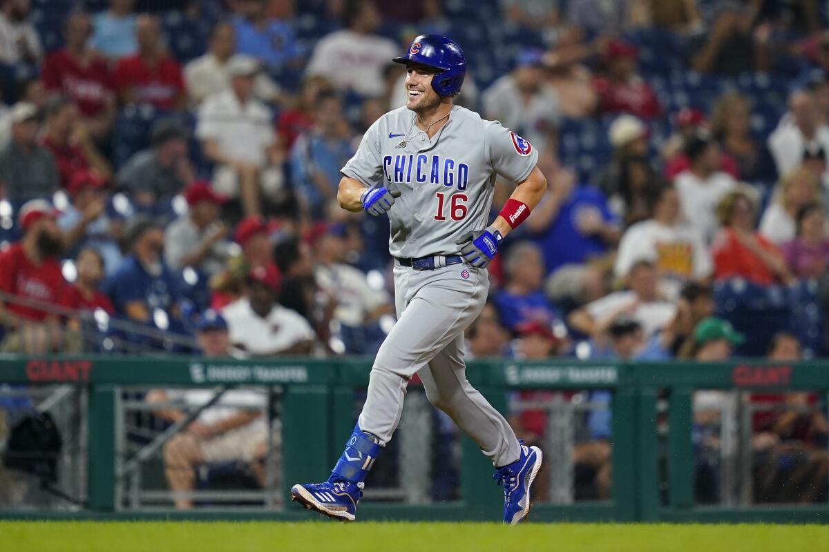 Chicago Cubs' Patrick Wisdom reacts after hitting a two-run home run off Philadelphia Phillies pitcher Kyle Gibson during the fifth inning of a baseball game against the Philadelphia Phillies, Tuesday, Sept. 14, 2021, in Philadelphia. (AP Photo/Matt Slocum)
