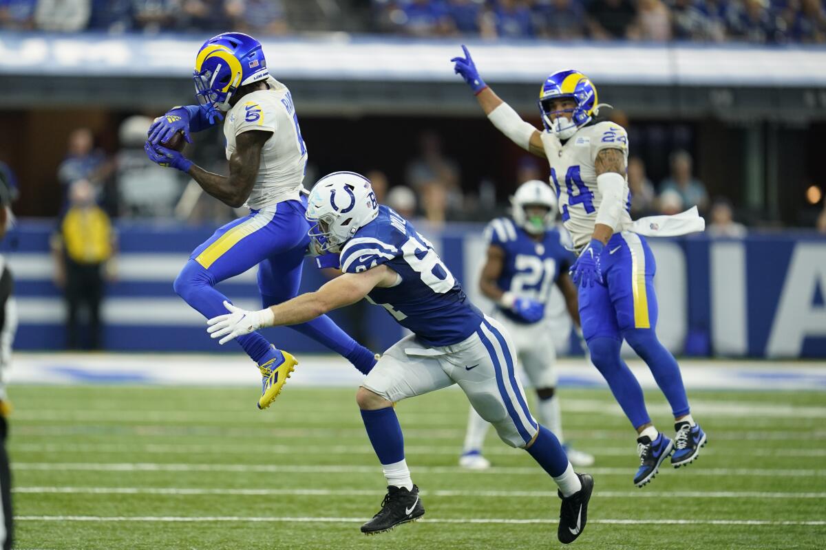 Rams' Jalen Ramsey (5) intercepts a pass intended for Indianapolis Colts' Jack Doyle.