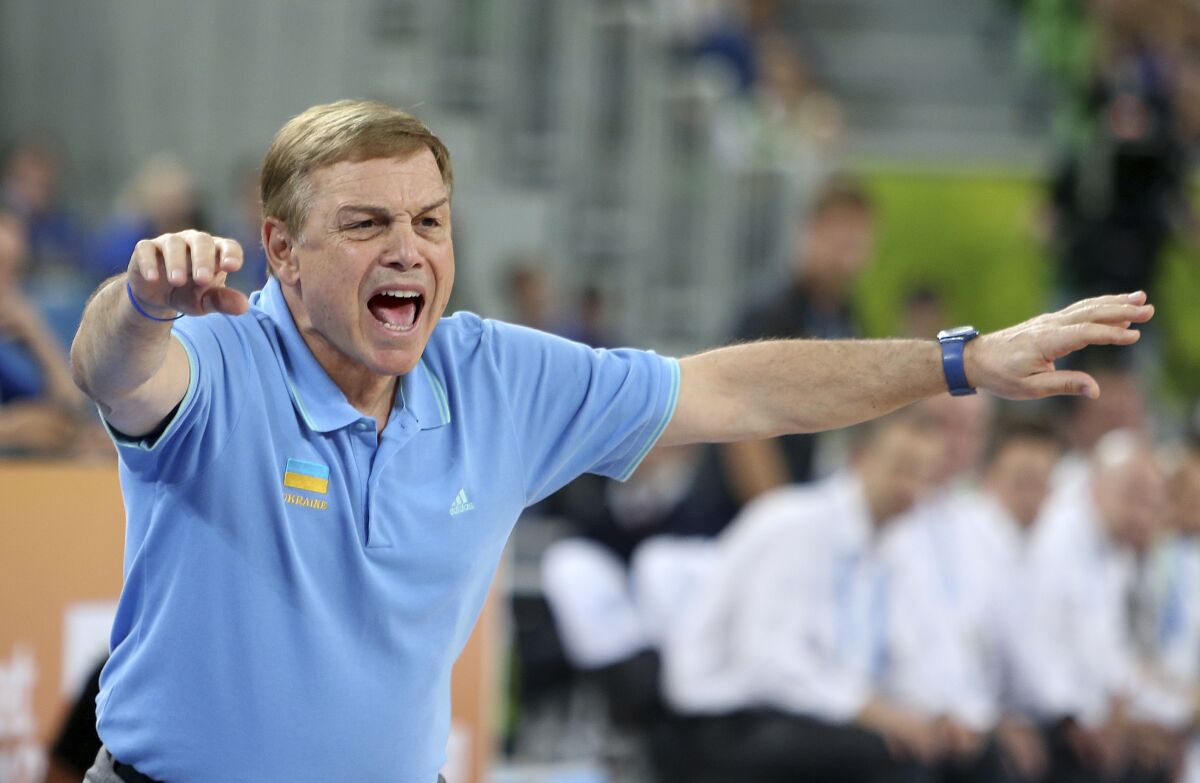 Ukraine's head coach Mike Fratello from the US instructs his players against Slovenia during their EuroBasket European Basketball Championship match at the Stozice Arena, in Ljubljana, Slovenia, Sept. 21, 2013. Fratello was announced Sunday, June 5, 2022 as this year's winner of the Chuck Daly Lifetime Achievement Award by the National Basketball Coaches Association. (AP Photo/Thanassis Stavrakis, file)