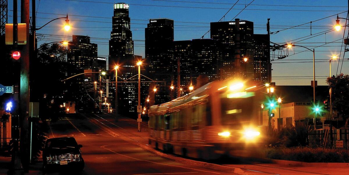 USC has discontinued a program that gave employees a $30 discount on monthly Los Angeles Metro system passes, which cost $100. Above, a Metro Gold Line train.