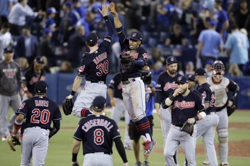 Cleveland celebrates after its 4-2 win against the Toronto Blue Jays in Game 3 the American League Championship Series on Oct. 17.