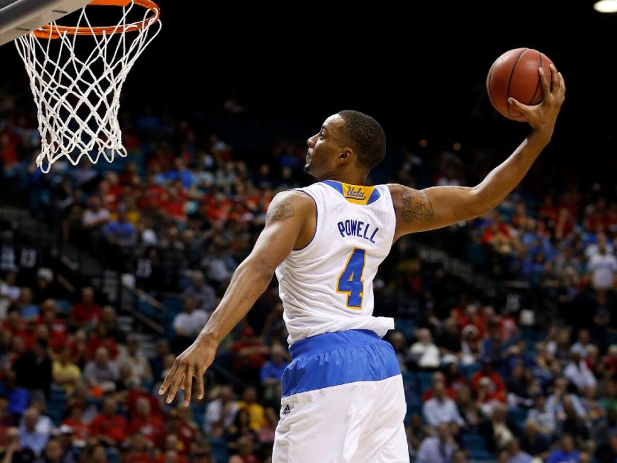 UCLA shooting guard Norman Powell goes up for a slam dunk on a fast break against USC in the Pac-12 tournament.