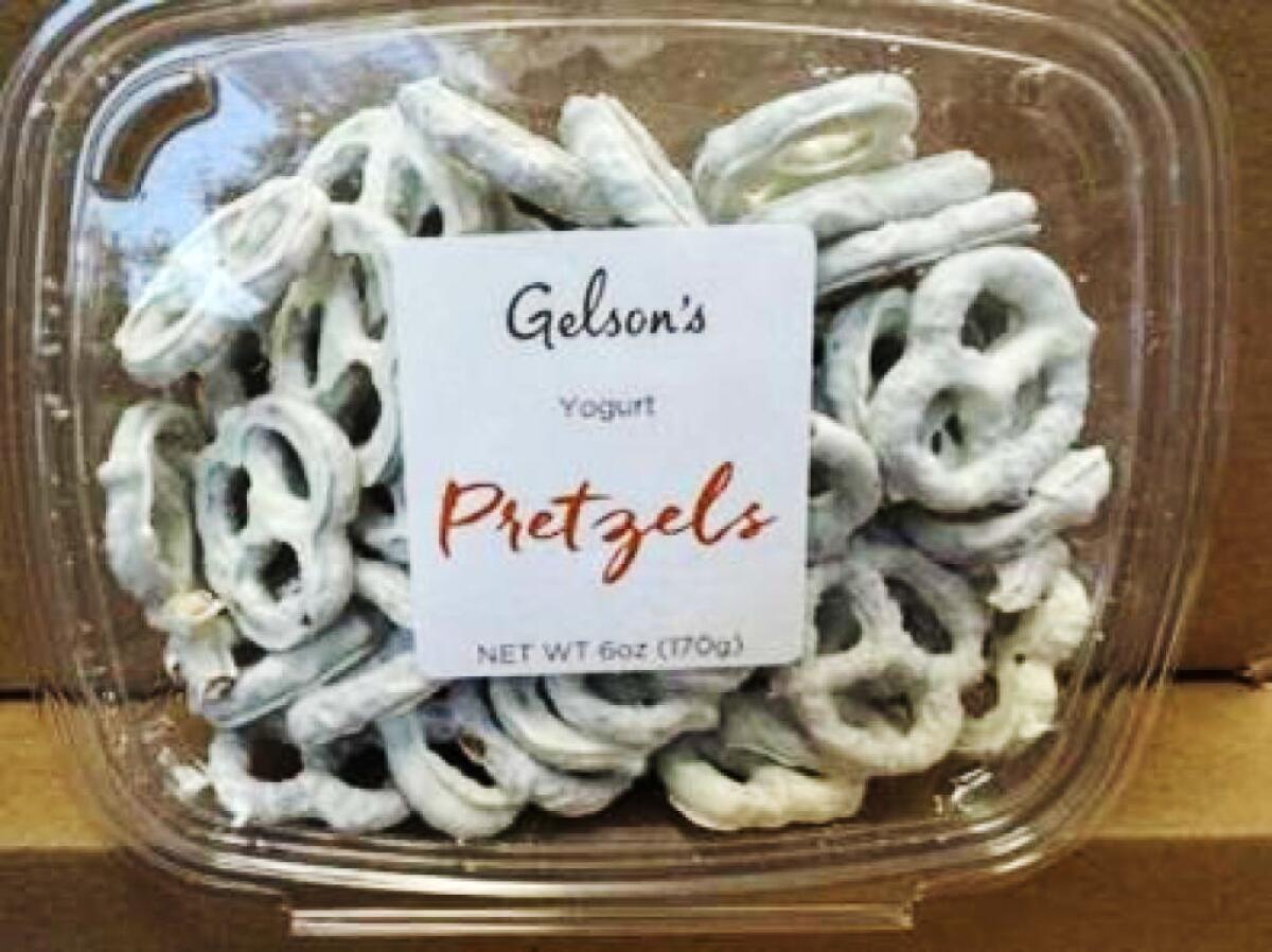 A plastic container of Gelson’s yogurt-covered pretzels