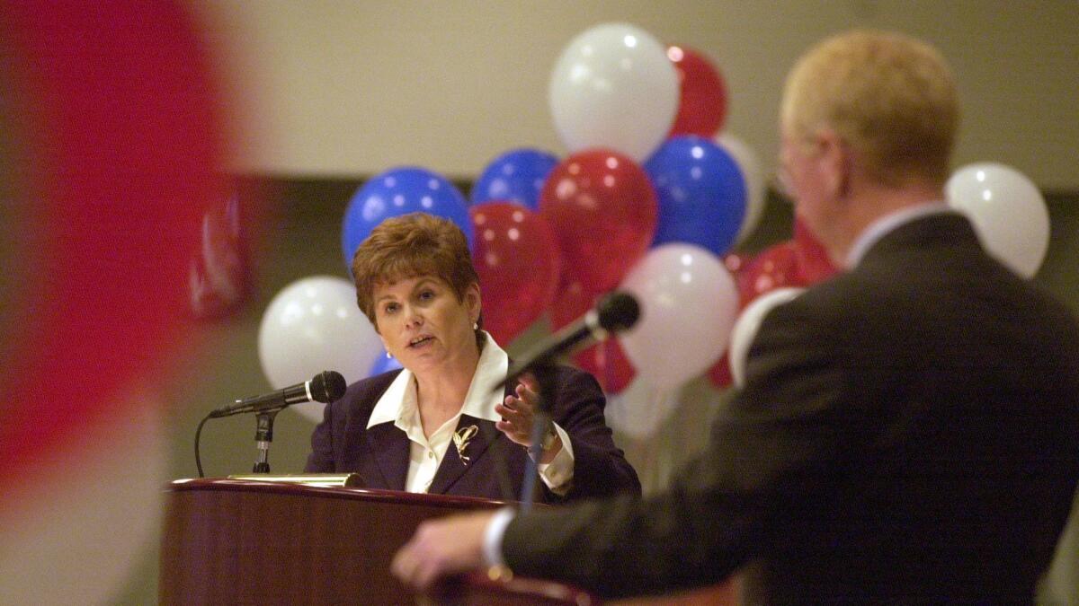 Bonnie Dumanis debates then-District Attorney Paul Pfingst in July 2002. She went on to unseat him in the November election.