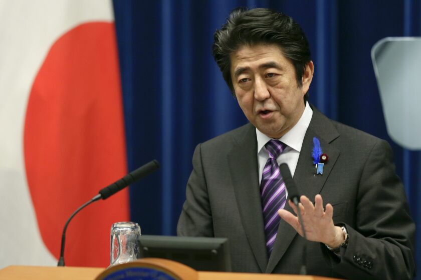 Japanese Prime Minister Shinzo Abe speaks during a news conference in Tokyo.