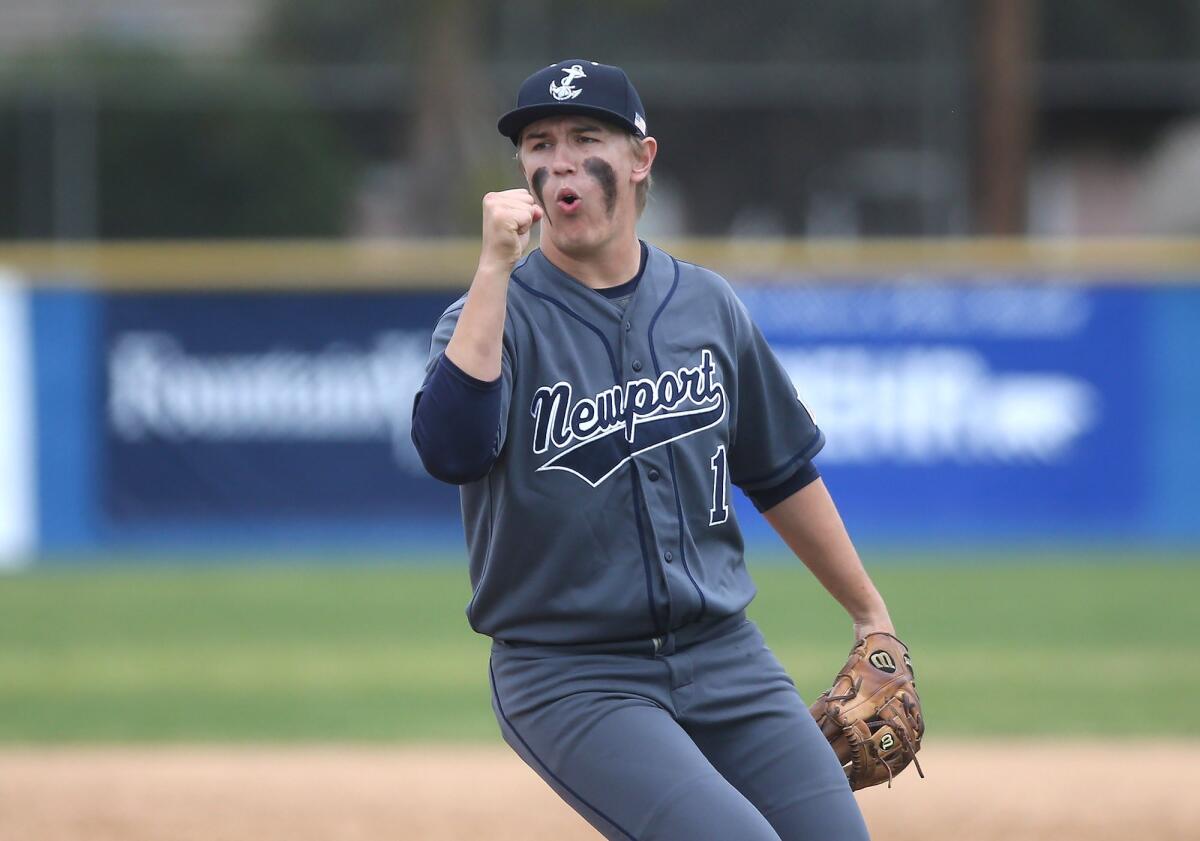 Newport Harbor High starter Kelly Austin reacts after going the distance in a Sunset Conference crossover game at Fountain Valley on Friday.