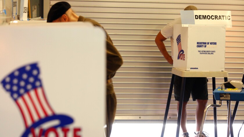 Westsiders cast their votes Tuesday at the polling place inside the lifeguard headquarters in Venice Beach.
