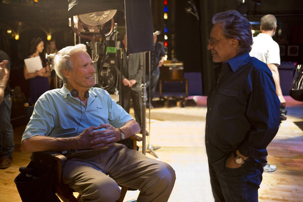 Director Clint Eastwood, left, and executive producer Frankie Valli on the set of "Jersey Boy."