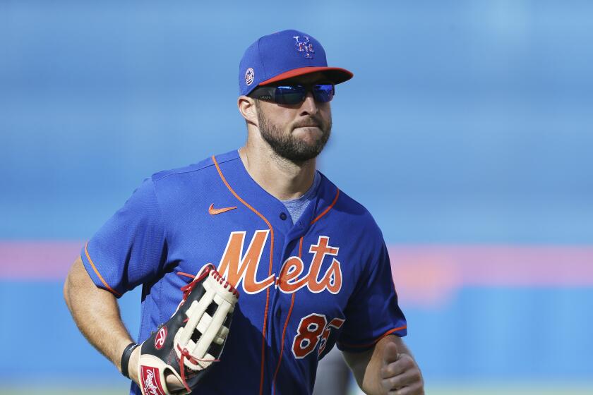 New York Mets' Tim Tebowduring a spring training baseball game against the Miami Marlins on Saturday, Feb 22, 2020, in Port St. Lucie, Fla. The Marlins won 5-3. (AP Photo/Vera Nieuwenhuis)