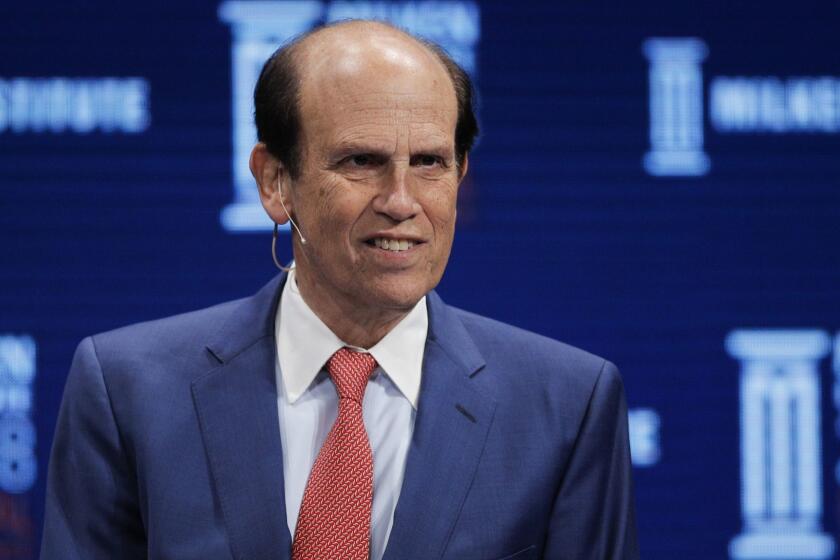 Moderator Michael Milken leads a discussion at the Milken Institute Global Conference Monday, April 30, 2018, in Beverly Hills , Calif. (AP Photo/Jae C. Hong)