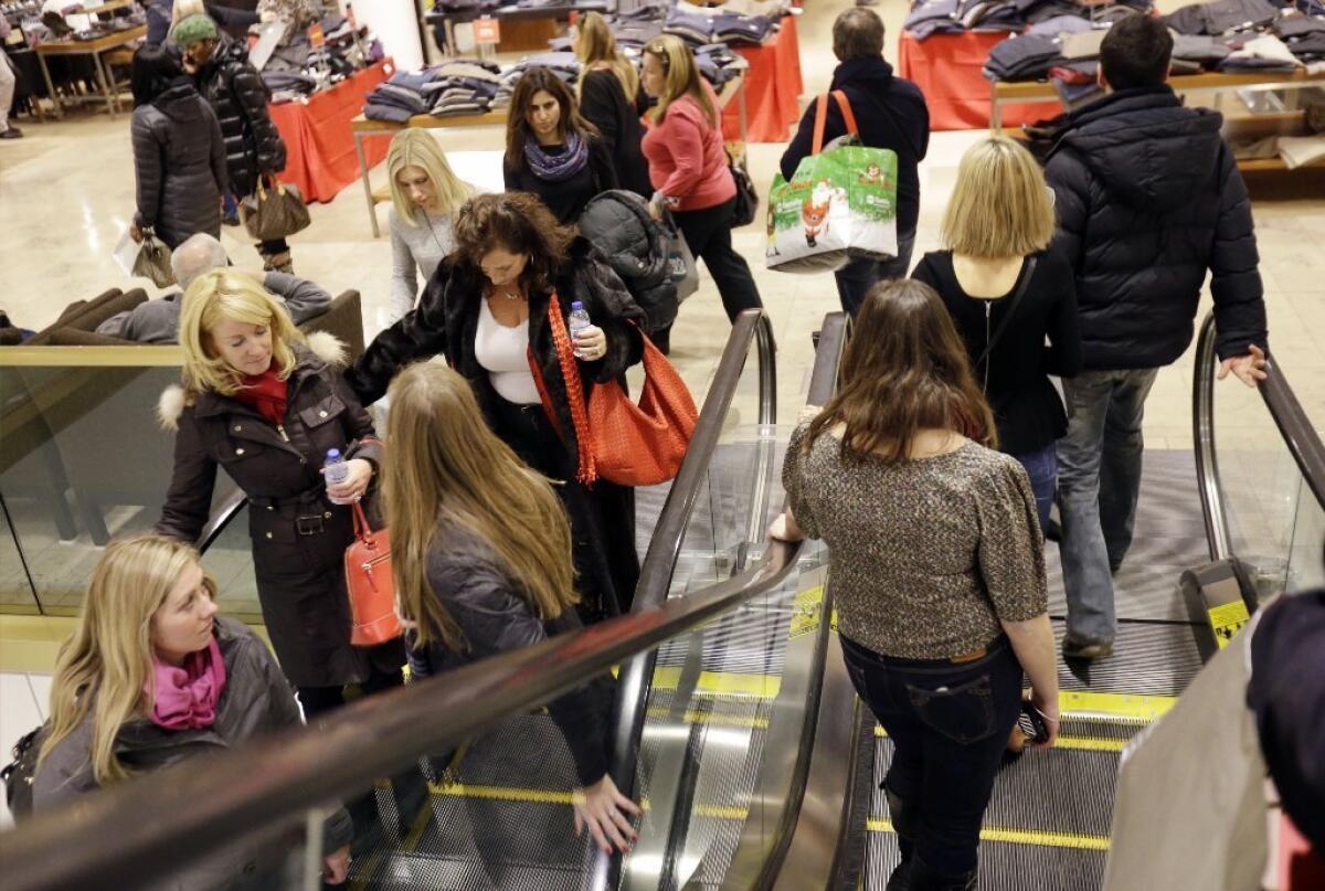 Christmas shoppers at a Chicago-area Nordstrom: But how did Sears and JCPenney do?