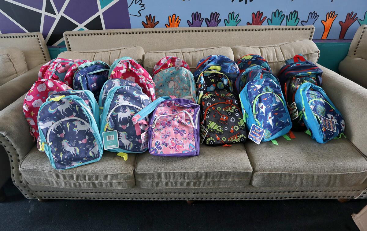 New backpacks are ready for distribution day at Rea Elementary School.