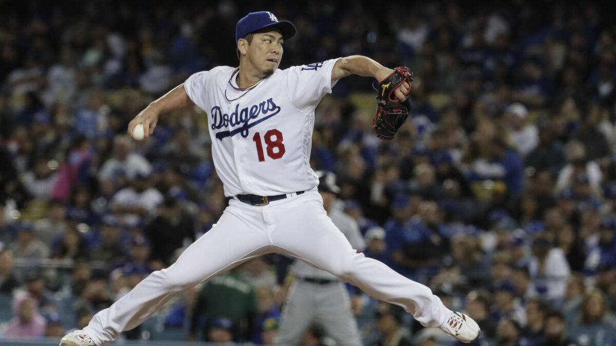 Dodgers starter Kenta Maeda delivers during the third inning of a 2-0 victory over the San Diego Padres on May 15.