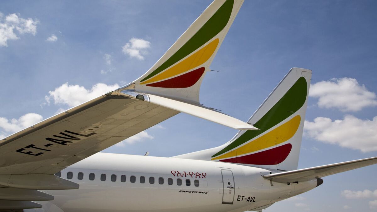 An Ethiopian Airlines Boeing 737 Max 8 sits grounded March 23 at Bole International Airport in Addis Ababa, Ethiopia.