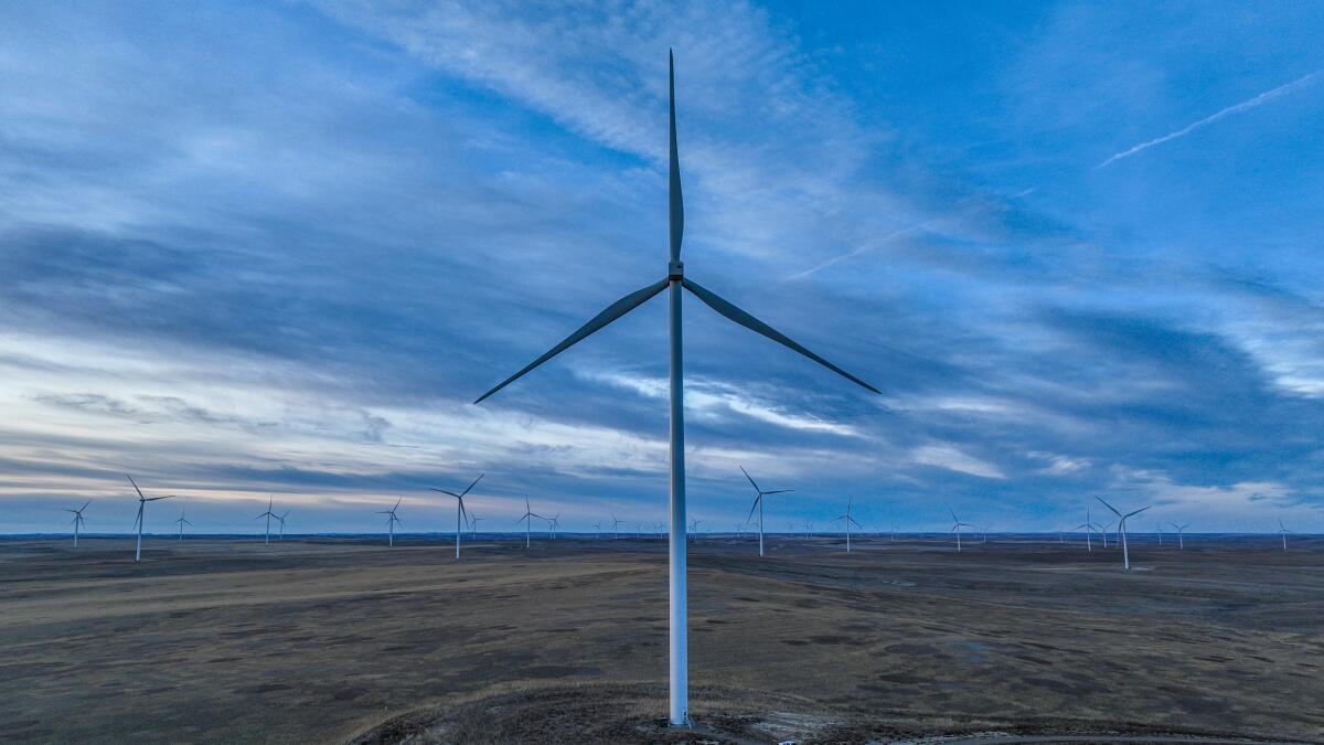 Turbines spin at Montana's Clearwater wind farm.