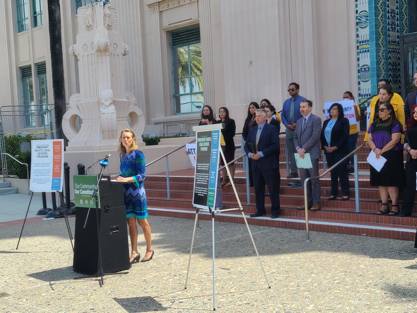 County Supervisor Terra Lawson-Remer speaks at a press conference celebrating the Immigrant Rights Legal Defense Program