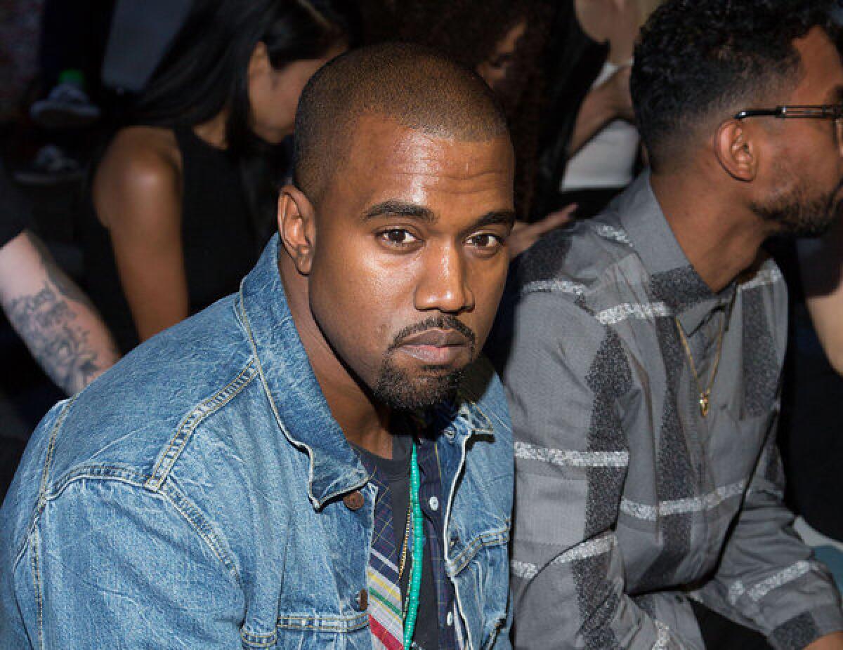 Kanye West, shown in 2012, pleaded not guilty through his attorney to misdemeanor battery and attempted grand theft charges.