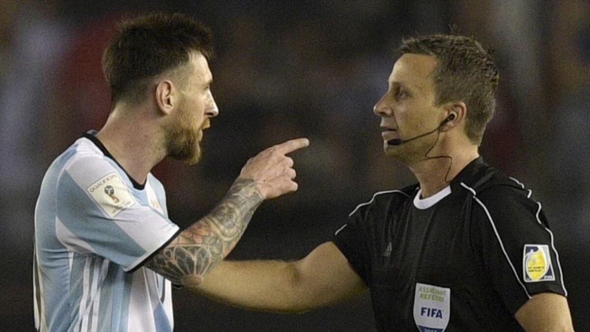 Argentina forward Lionel Messi argues with assistant referee Emerson Augusto de Carvalho at the end of a World Cup qualifier against Chile on March 23.