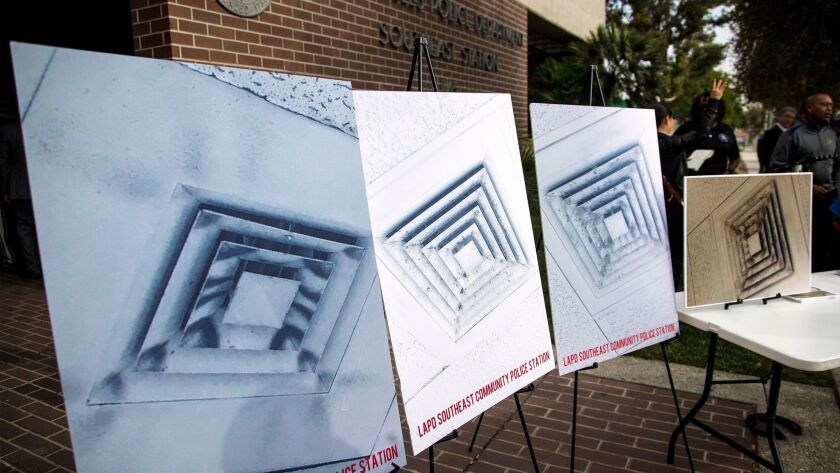 Photos depicting black mold on heating and air-conditioning vents are on display by the Los Angeles Police Protective League, which is demanding the city immediately eradicate unsanitary conditions in and around the Southeast Community Police Station.