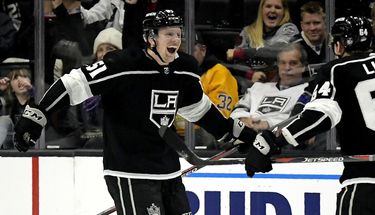 Kings left wing Austin Wagner, left, celebrates his first NHL goal with right wing Matt Luff during the third period of a a game against the Avalance on Nov. 21.