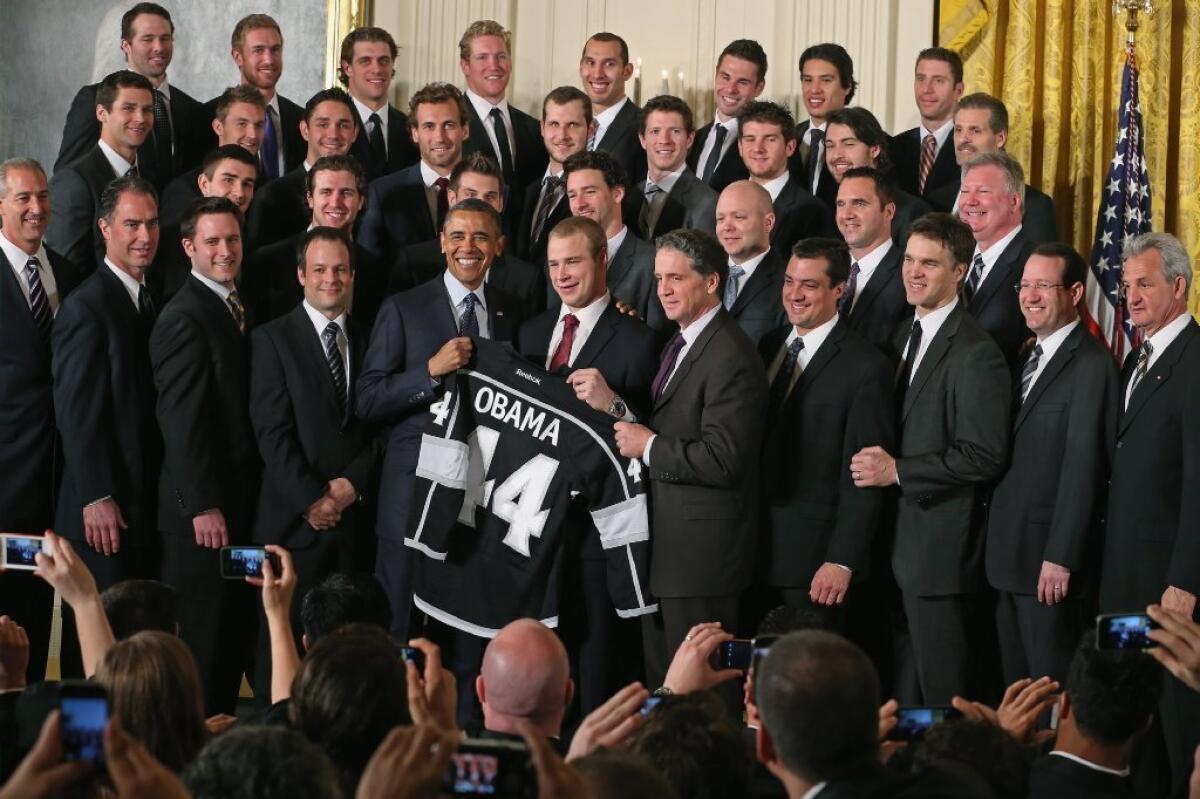 President Obama poses with the Kings in the East Room of the White House.