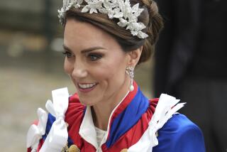 Princess of Wales, Kate Middleton, arrives for the Coronation of King Charles III, in London in regal robes