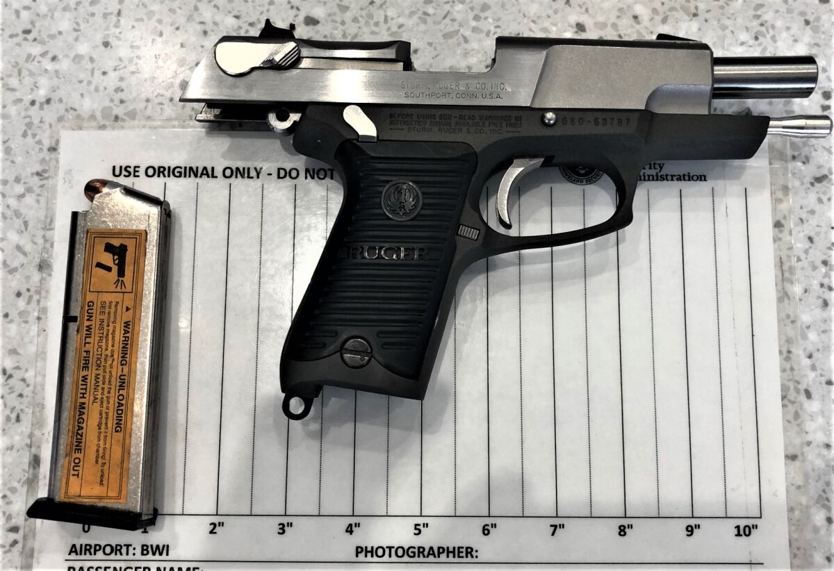 Handgun found in a carry-on bag