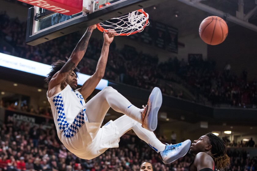 Nick Richards dunks during Kentucky's 76-74 victory that ended Texas Tech's nonconference home-game winning streak at 54.