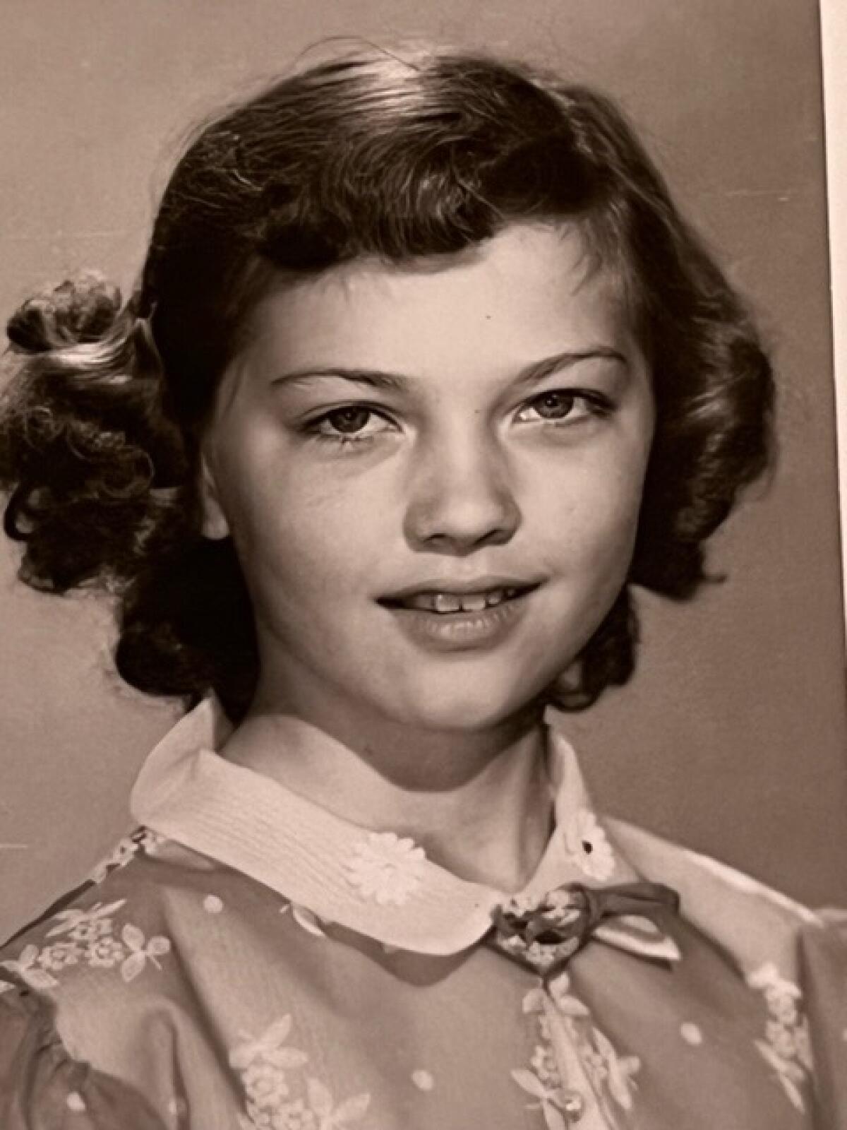 black-and-white headshot of a young girl