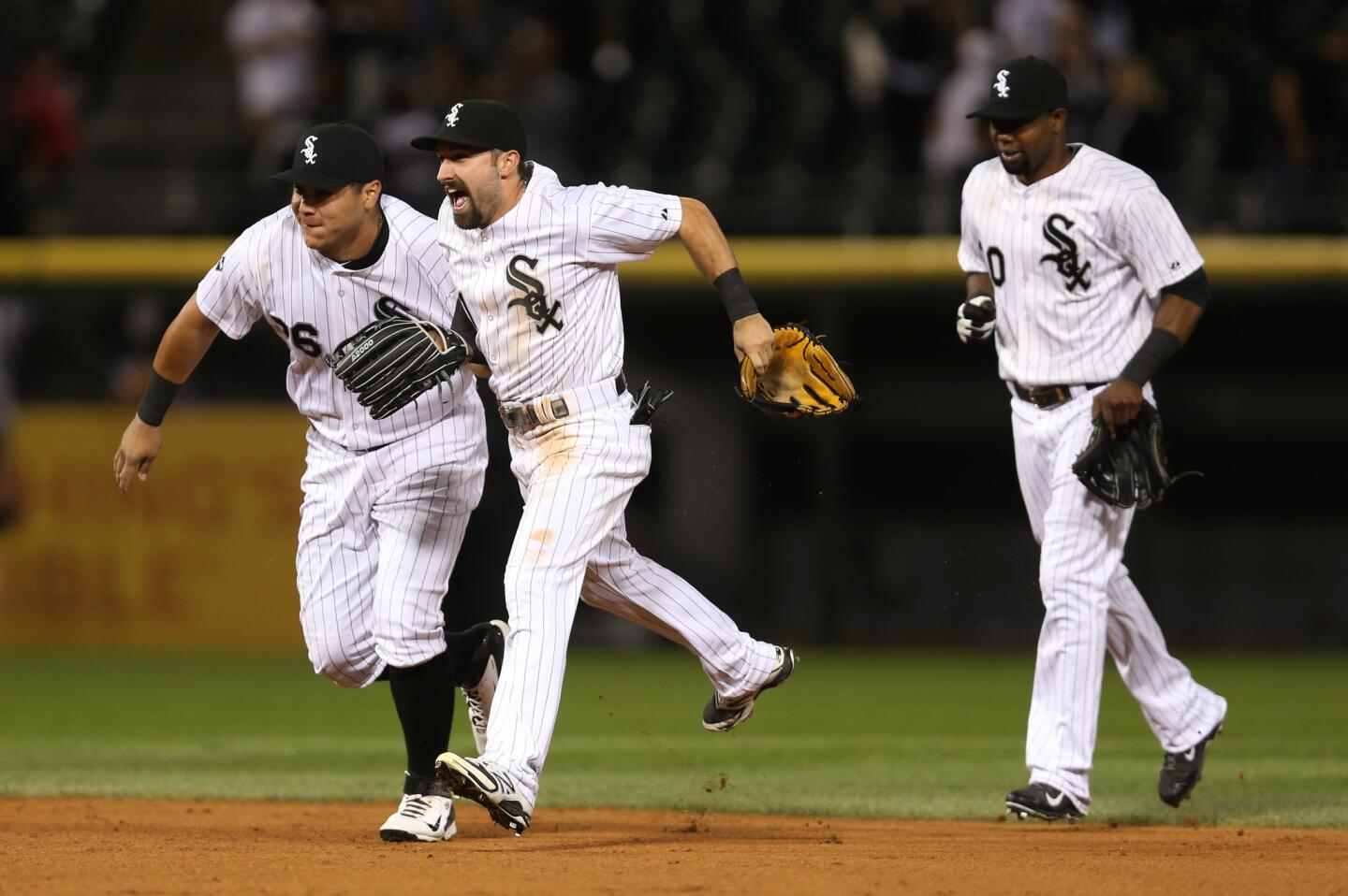 Adam Eaton celebrates alongside Avisail Garcia after a victory over the Indians.