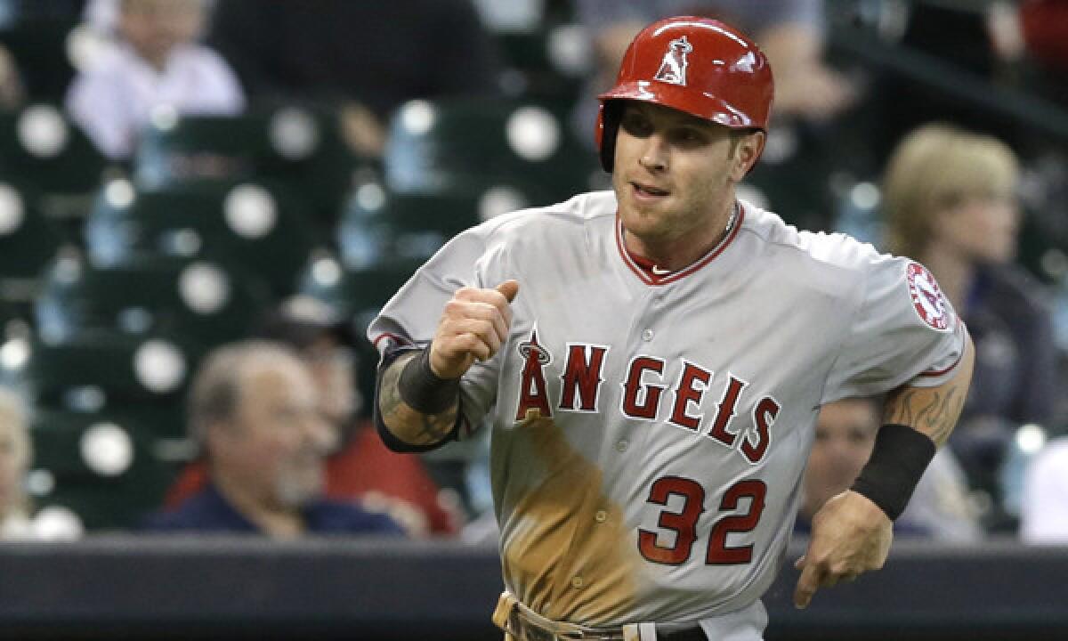 Photo: Rangers Josh Hamilton breaks his bat during game 2 of the