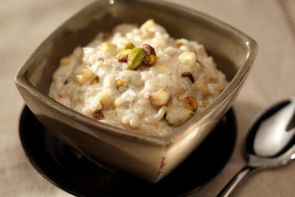 Scented with cinnamon, cardamom and nutmeg and flavored with chopped pistachios and diced fresh bananas. Recipe: Banana and pistachio rice pudding