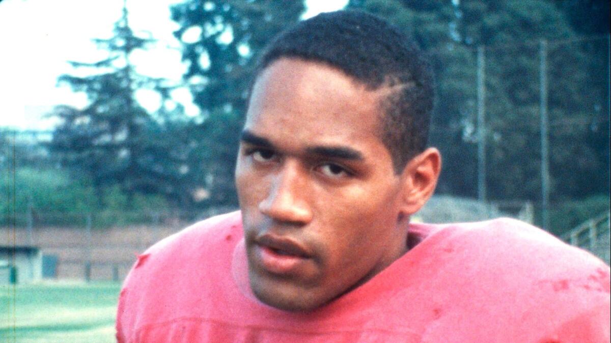 O.J. Simpson is shown as a running back at USC. (ESPN / Sundance Film Festival)