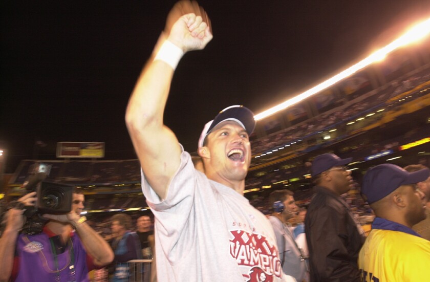 John Lynch celebrates at Qualcomm Stadium after Tampa Bay defeated Oakland in Super Bowl XXXVII in January 2003.