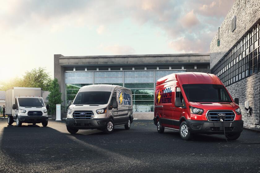 Ford's all-electric E-Transit commercial vans will be offered in several configurations. This picture shows three of them.
