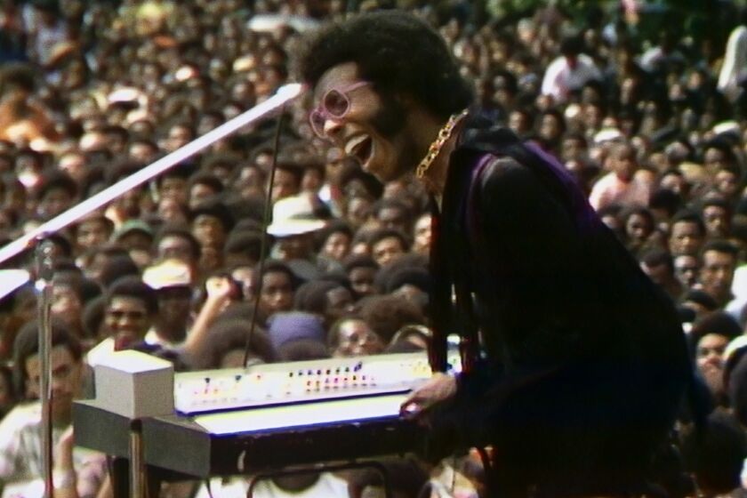 Sly Stone performing at the Harlem Cultural Festival in 1969.