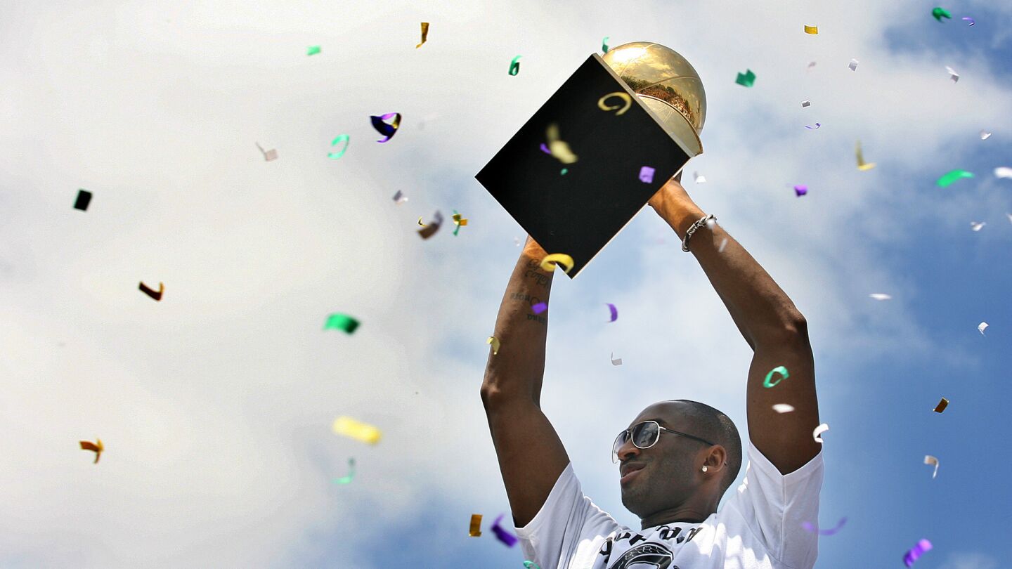 Lakers star Kobe Bryant celebrates his fifth NBA title during the team's championship parade on June 21, 2010.