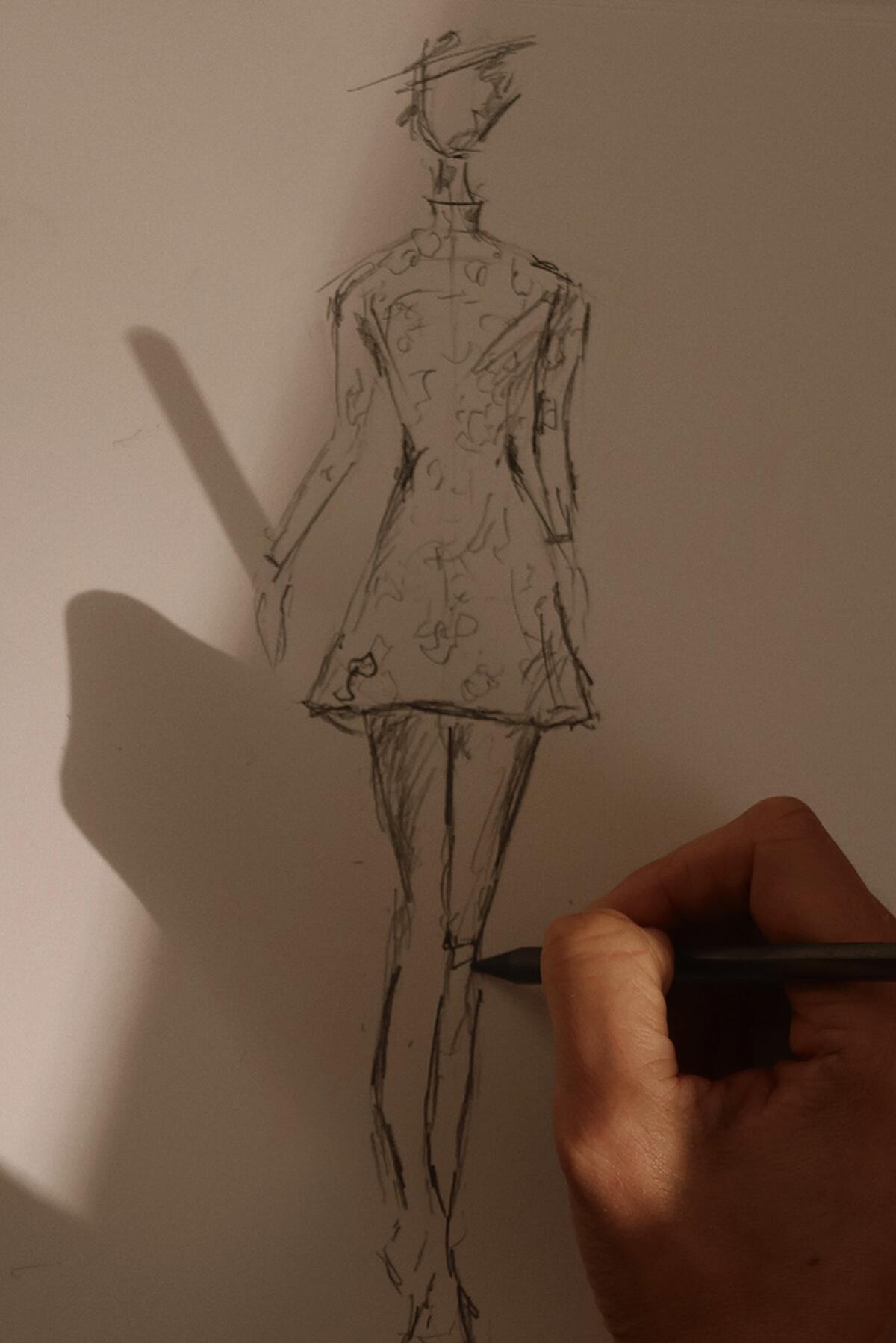 a sketch of a dress design by Madison Woolley