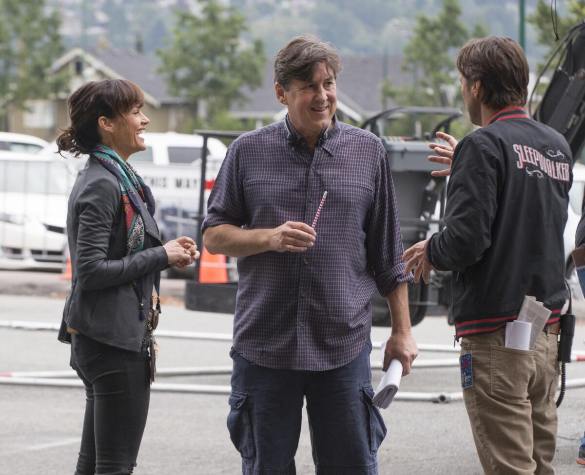 Carla Gugino, left, Cameron Crowe and Luke Wilson behind the scenes on "Roadies." (David Dolsen / Showtime)