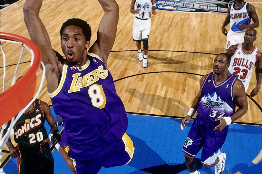 NEW YORK - FEBRUARY 8: Kobe Bryant #8 of the Los Angeles Lakers attempts a dunk during the 1998 NBA All-Star Game on February 8, 1998 at Madison Square Garden in New York, New York. NOTE TO USER: User expressly acknowledges that, by downloading and or using this photograph, User is consenting to the terms and conditions of the Getty Images License agreement. Mandatory Copyright Notice: Copyright 1998 NBAE (Photo by Andrew D. Bernstein/NBAE via Getty Images)